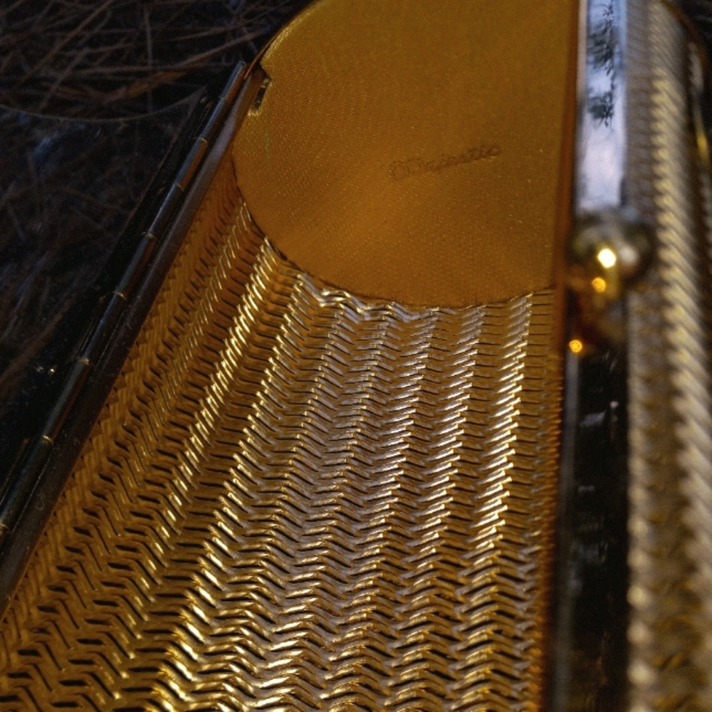 Majestic metal purse with lucite handle